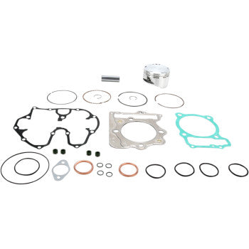 The Honda Piston Kit with Gaskets 86.00 mm by Wiseco includes multiple gaskets, O-rings, seals, a Wiseco piston, and a metal pin—all displayed on a white background.