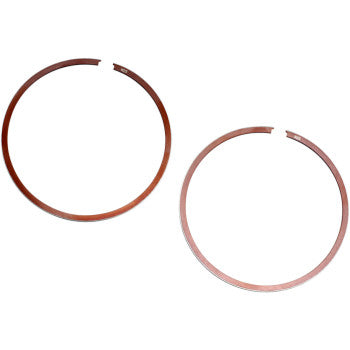 Two metallic rings from the Wiseco Ring Set are placed side by side on a white background, each forming an almost complete circle with a small gap.