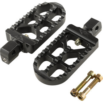 Two Serrated Footpegs - Black - Long by Joker Machine, CNC-machined aluminum with serrated edges and mounting holes, shown with two gold bolts and nuts on a white background.