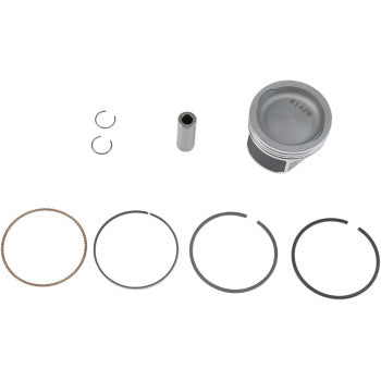 The Polaris Piston Kit 80.00 mm by Wsm includes a metal piston, wrist pin, two upgraded E-clip circlips, a thin textured ring, and three thicker piston rings, all arranged neatly against a white background.