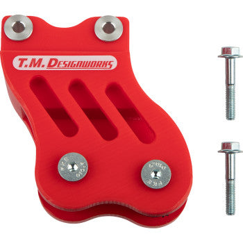 The Honda TRX Chain Guide Red by T.M. Designworks, with silver bolts attached and two extra bolts beside it on a white background, features built-in UV protection for long-lasting durability.