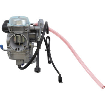 Metallic gray Arctic Cat replacement carburetor with black hoses and a pink fuel line attached.