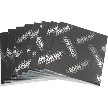 Eight black rectangular Boom Mat™ sheets (12 x 12.5) by DEI, printed with BOOM MAT in white, are shown stacked and fanned out, designed for sound deadening and noise damping insulation.