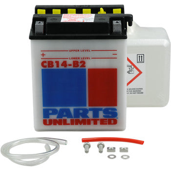 The Parts Unlimited Battery YB14 B2, featuring lead calcium alloy for extra cranking power, is shown with its white acid container, clear tubing, red tube, bolts, nuts, and washers arranged on a white surface.