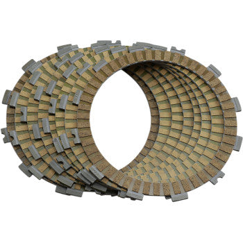The Clutch Plate Kit Fiber by Hinson Racing features alternating metal and fiber plates with notched edges, designed in a stacked, fanned-out pattern to help maintain OEM clutch baskets and extend clutch basket life.