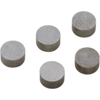 Five Valve Shim 8.90 x 2.24 discs by Moose Offroad are arranged irregularly on a white background, showing the full 5 pack of small, round, silver-colored metal shims typically included in offroad valve shim kits.