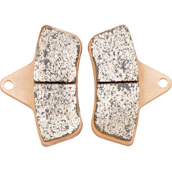 Two metallic Arctic Cat Brake Pads by Sbs are displayed side by side with textured surfaces and attachment holes, delivering class-leading friction and low rotor wear.