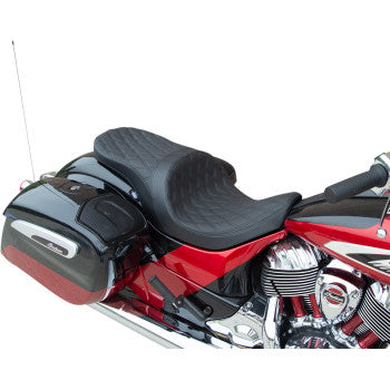 Black low profile motorcycle seat with double diamond stitch pattern, contoured shape on red bike.