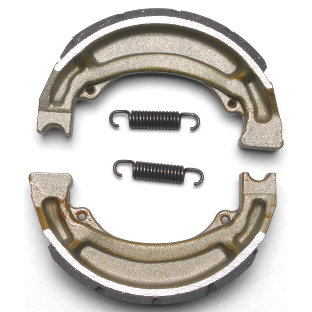 Grooved metallic brake shoes with black friction lining and two black coil springs for offroad use.