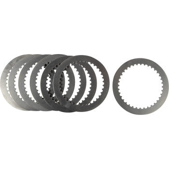 A set of seven Kawasaki - Suzuki Steel Clutch Plates by Prox is displayed in a row on a white background, with one plate upright to the right to show its inner and outer teeth. All plates meet OEM specifications.