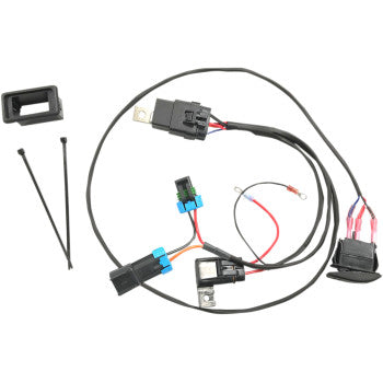 The Switch Polaris Fan Override by Namz is a wiring harness kit for electric coolant fans, featuring plug-and-play installation, sealed relay, connectors, switch, fuse holder, zip ties, and blue/red-tipped wires—shown on a white background.