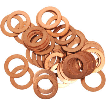 Copper-colored circular drain plug washers with smooth surfaces and uniform thickness.