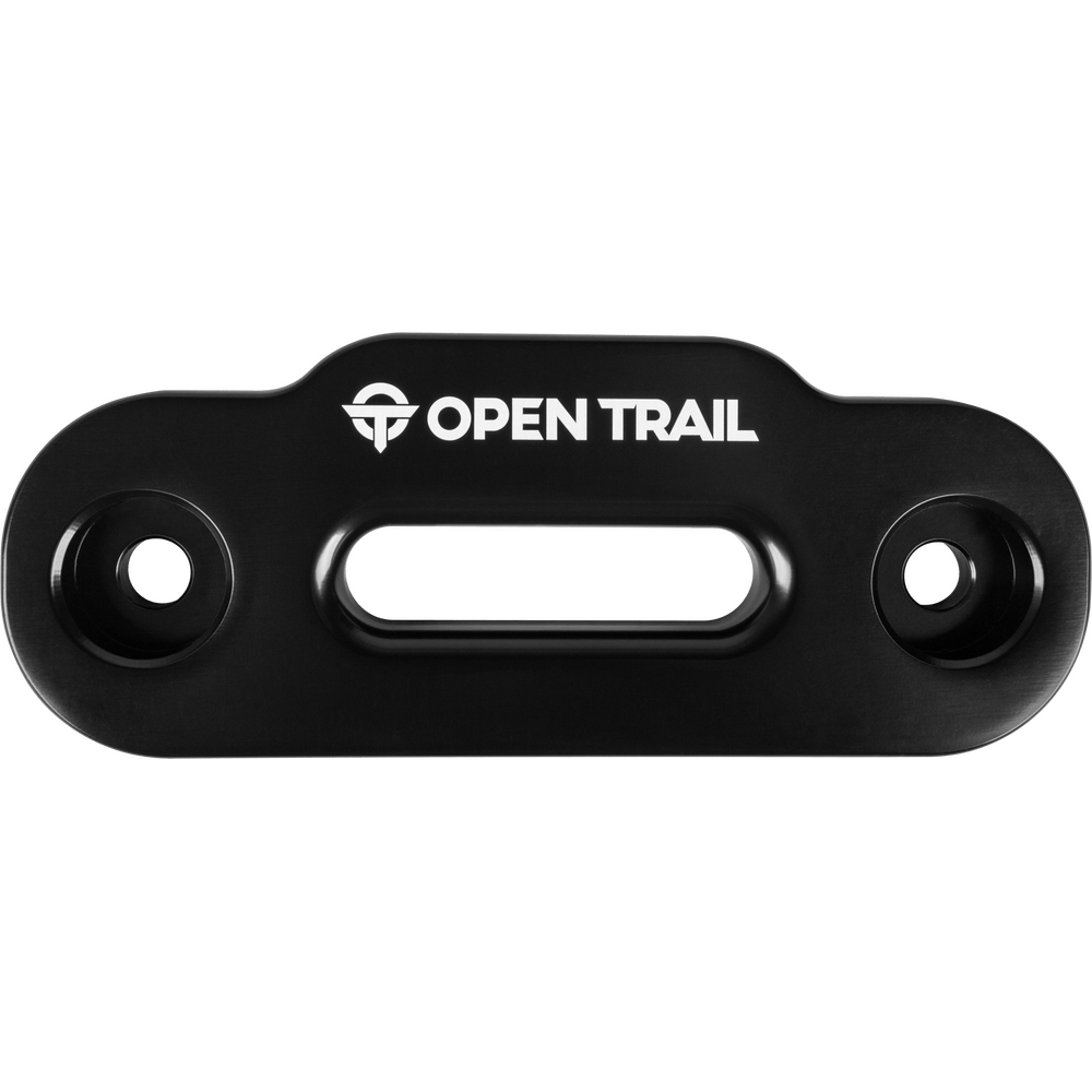 The Hawse Fairlead by Open Trail is a black metal plate with two mounting holes and a central horizontal slot, displaying the OPEN TRAIL logo in white at the top.