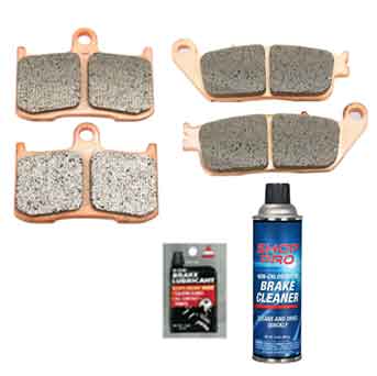 The Sintered Brake Pad Kit for Victory Motorcycles 2008-2017 by Witchdoctors includes four sintered brake pads, brake lubricant, and cleaner—all arranged on a white background.