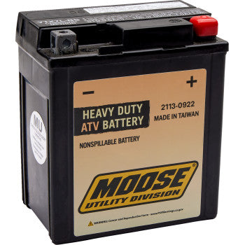 Black rectangular AGM heavy-duty ATV battery with red positive terminal and beige label reading Moose Utility Division.