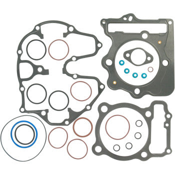 The Honda Top End Gasket Kit 87 mm by Cometic includes MLS head gaskets, O-rings, and various seals arranged on a white background, all designed with Extreme Sealing Technology for superior performance.
