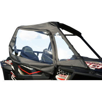 The Polaris RZR Soft Enclosure Upper Black by Seizmik is a marine-grade polyester canvas and clear vinyl door, installed on the side of a black and red UTV, securely covering the cabin and seats.