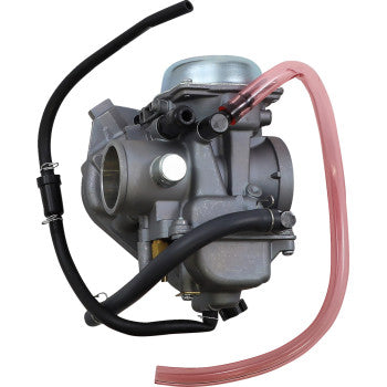 Gray metal Kawasaki replacement carburetor with attached black and pink fuel hoses.