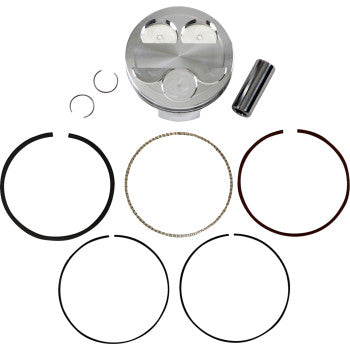 The Piston Kit by JE Pistons includes forged aluminum pistons, a wrist pin, two circlips, and five piston rings, all displayed on a white background.