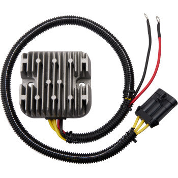 Black and silver metal Polaris regulator/rectifier with cooling fins, attached wiring harness with black connector and red.
