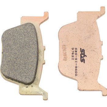 Off-road sintered brake pads with textured friction surface and copper-colored backing plate embossed with SBS logo and part