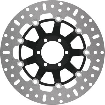 A close-up of the Brake Rotor - Floating by Ebc shows a round, perforated motorcycle disc with a black center and silver edge, designed with holes and slots to enhance heat dissipation and overall performance.