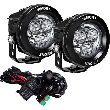 The Light Cannon CG2 3 3/4" Multi LED Clear Lens by Vision X, shown in black round housings with ultra-bright LEDs, comes with a wiring harness and switches for easy installation on your vehicle.