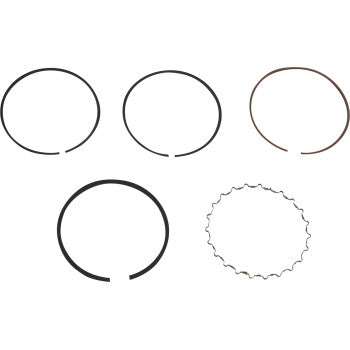 Five rings from a Wiseco Ring Set are displayed on a white background: four solid-colored black and brown rings and one corrugated, wavy metallic ring.