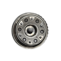Round metal magneto rotor with central circular hole and eight black circular magnets evenly spaced around center.