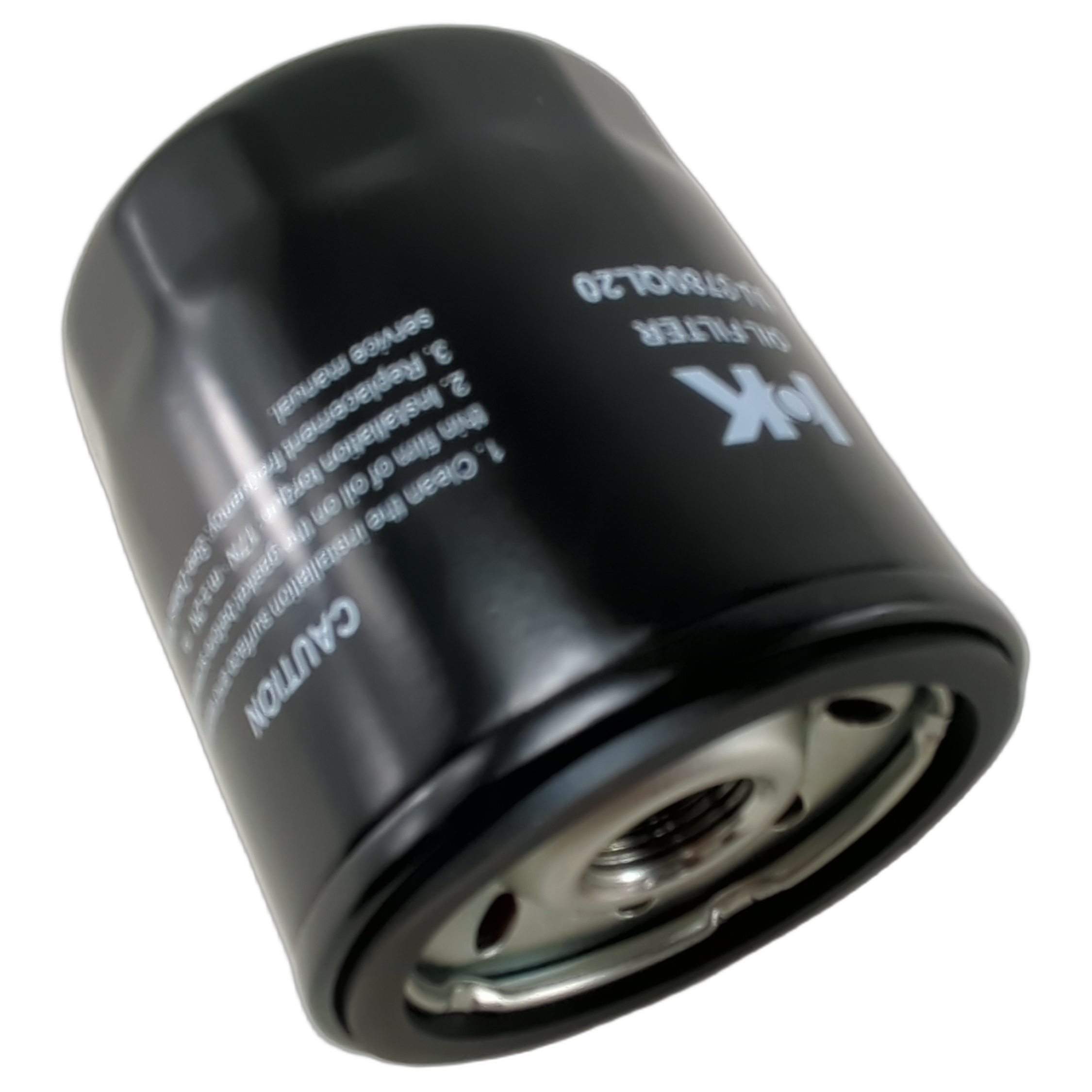 Black cylindrical metal oil filter with threaded center hole and white printed text on the side.
