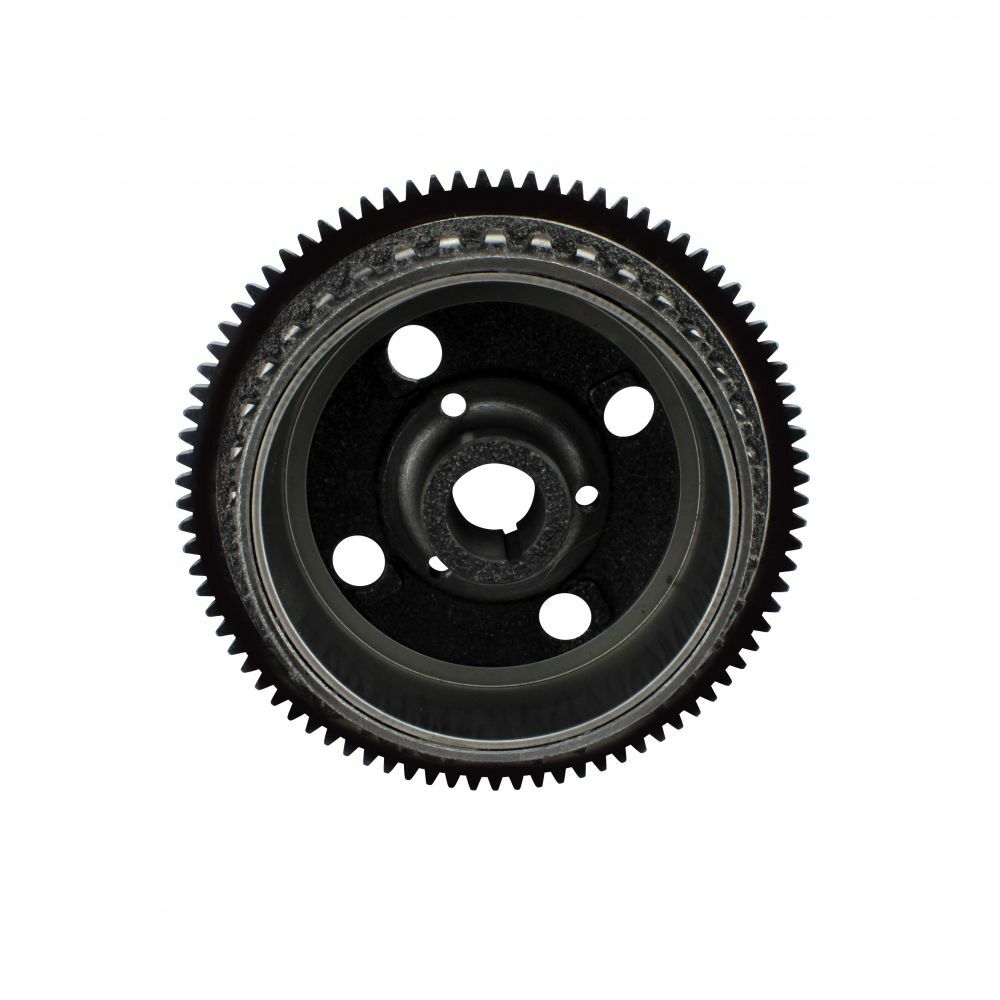 Black metal flywheel with evenly spaced teeth around the outer edge and five circular holes near the center.