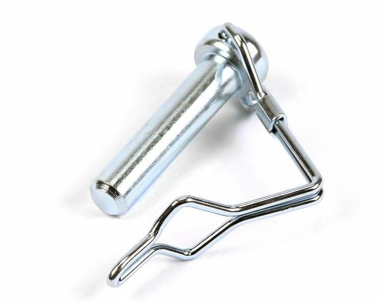 A close-up of the Snow Plow Clevis Pin by Warn features a silver metal pin with a bent wire lock, designed for securing plows and towing equipment, displayed on a white background.