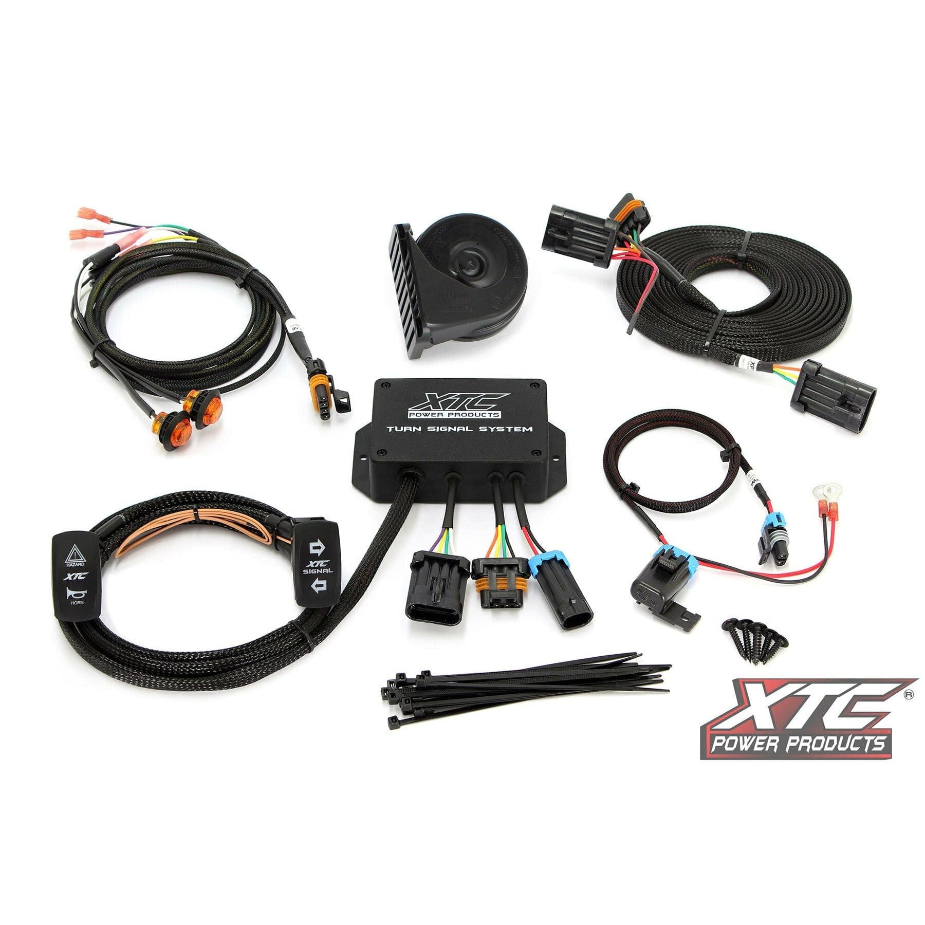 The Standard Turn Signal Kit Pol by XTC Power includes pre-made wire harnesses, connectors, switches, a horn, zip ties, and a control module—all displayed on a white background with the XTC logo.