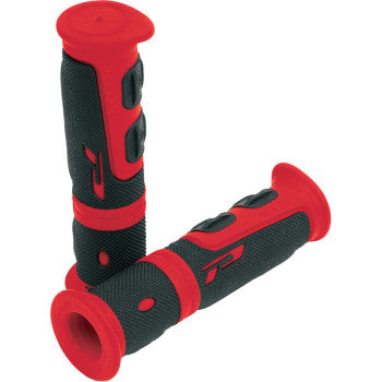 A pair of 964 Evo Grips Red / Black by Pro Grip, made for 7/8 handlebars with raised details and stylized markings. The tear-resistant grips are shown angled against a white background.