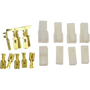 Set of gold-colored metal electrical terminal connectors with white plastic housing covers for wiring harness assembly.