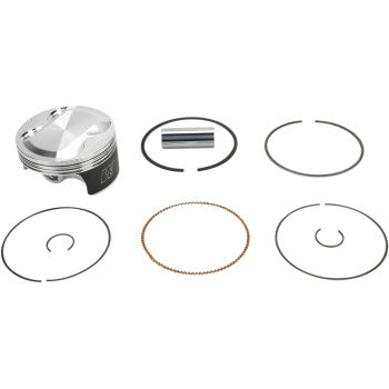 The Yamaha Piston Kit 102.00 mm by Wiseco features a forged 4-stroke silver piston, piston pin, and five rings, all arranged on a white background to showcase its performance and optimal strength-to-weight ratio.