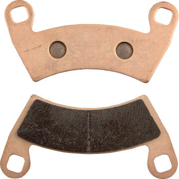 Copper-colored metal brake pad and black friction material brake pad with curved shape and mounting holes.