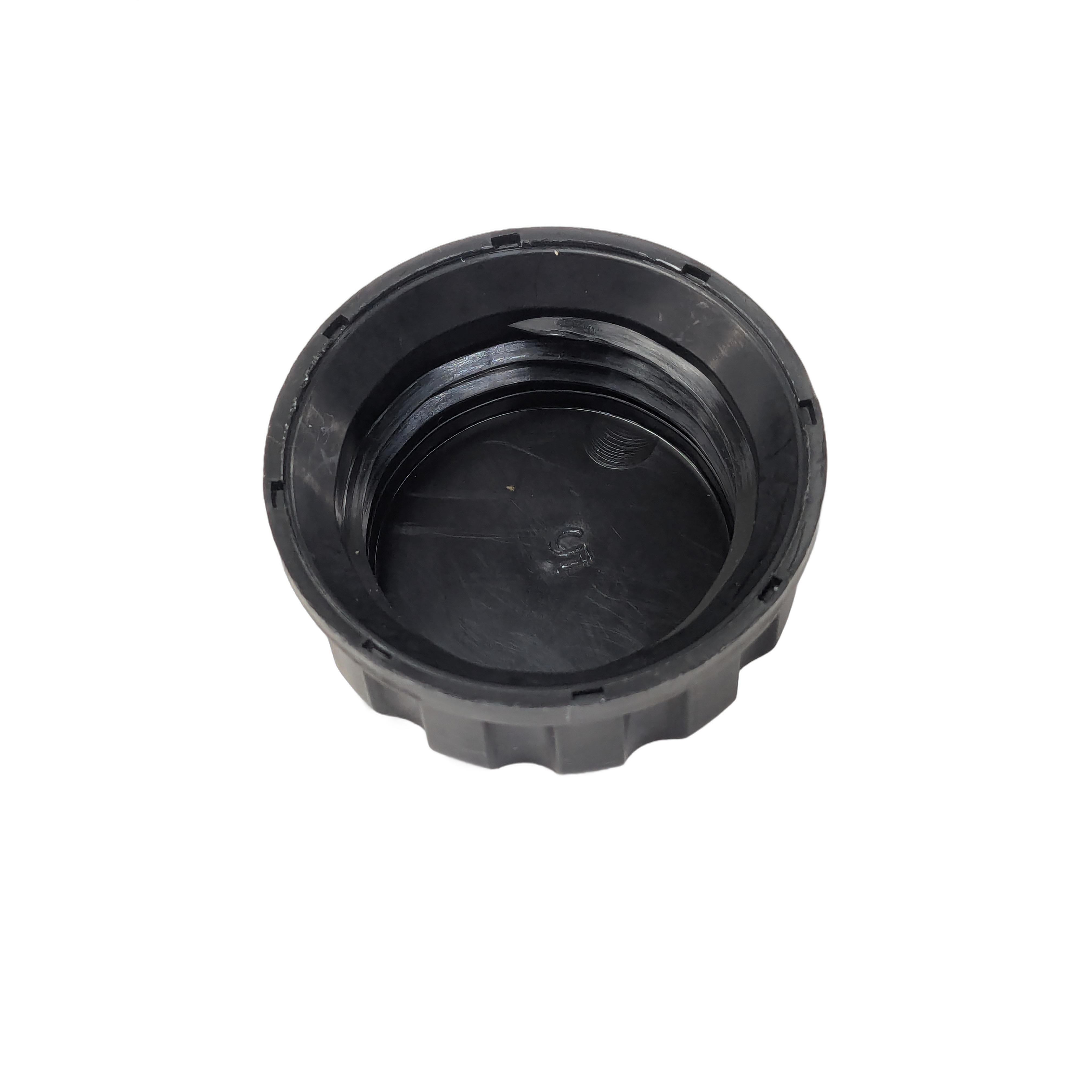Black plastic cylindrical cap with threaded interior and outer ridged edge for grip.