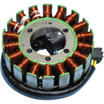Circular stator with multiple copper wire coils evenly spaced around a central metal core and a black connector attached.