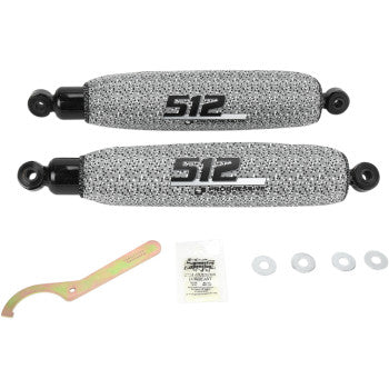 Pair of gray textured 512 Series front shocks with black mounting ends, wrench, washers, and lubricant packet.