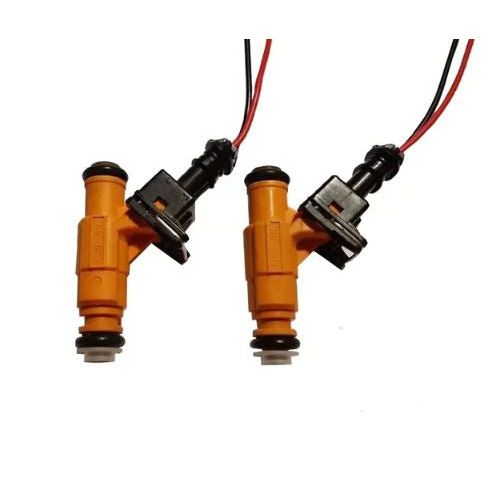 Pair of orange Bosch-style fuel injectors with black electrical connectors and red and black wires.