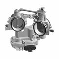 Dual bore throttle body in silver metal with black circular throttle plates and electrical connector at base.