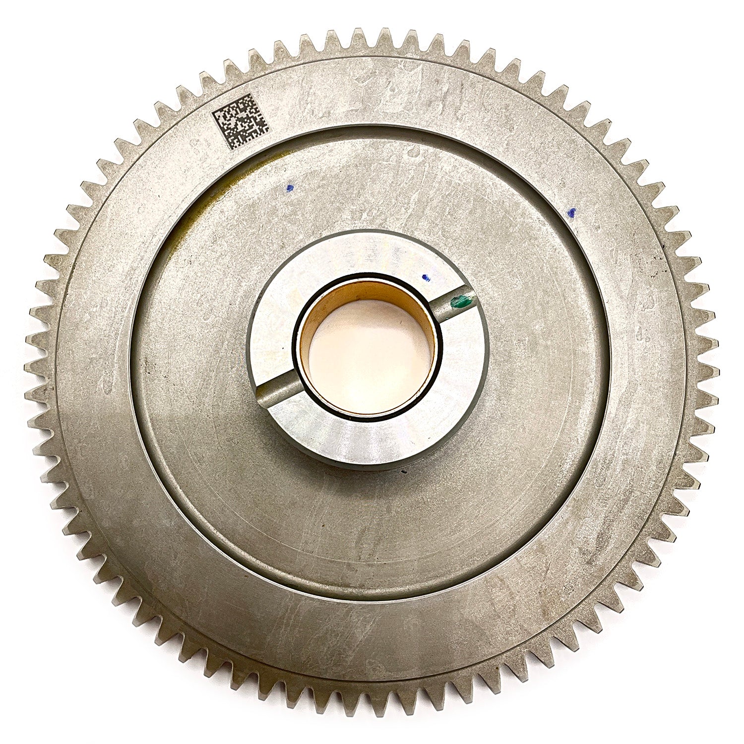 Metal gear starter crank with evenly spaced teeth and central circular bearing hole.