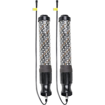 The Whip Light Super Chunk 1' Pair by Brite-Lites features two black handheld LED work lights with clear cylindrical covers, multiple visible LEDs, and convenient setup using a Quick Disconnect Magnetic Base.