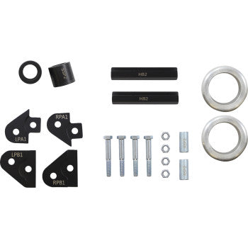 Black metal brackets, silver spacers, bolts, washers, and nuts arranged in a Polaris lift kit set.