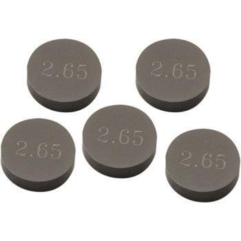 A 5-pack of Prox Valve Shims (9.48 mm x 2.65 mm) is shown clustered on a white background, each round metal disc engraved “2.65.” Precision machined for maximum durability in demanding applications.