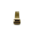 Brass-colored metal weight shift component with curved shape and cylindrical ends.