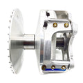 Polished aluminum drive clutch with a large round sheave and dual-arm mounting bracket with bronze bushings.