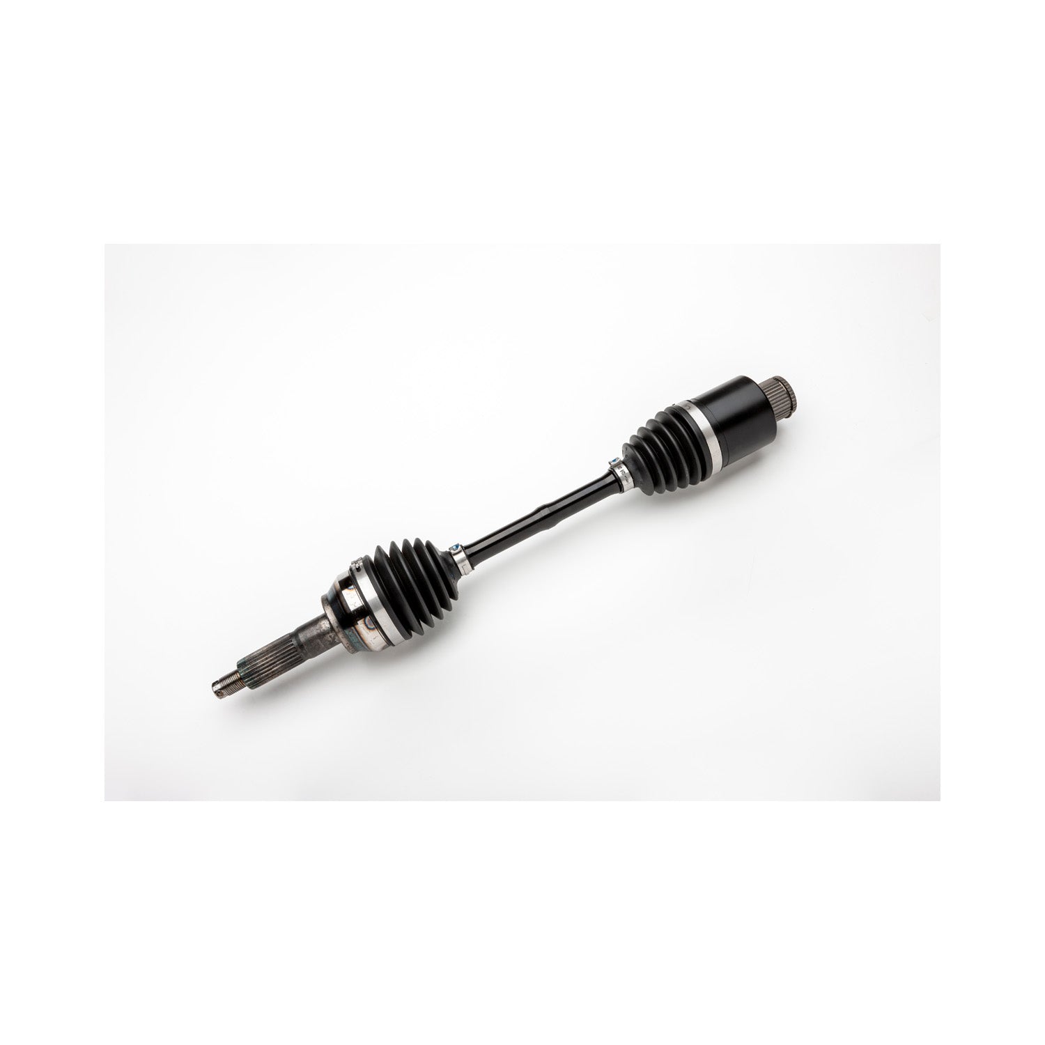 Black metal axle shaft with rubber accordion-style protective boots on both ends against a white background.