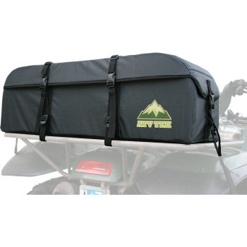 The Expedition Cargo Bag Black by Atv-Tek, featuring a mountain logo, is strapped to the tubular steel rear rack of an ATV.